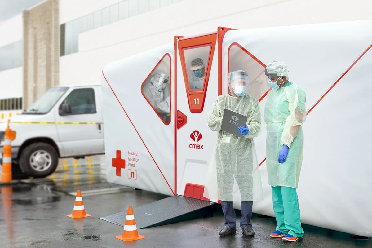 Illustrative Cmax Med isolation ward outside a hospital, with medical staff beside the entrance.